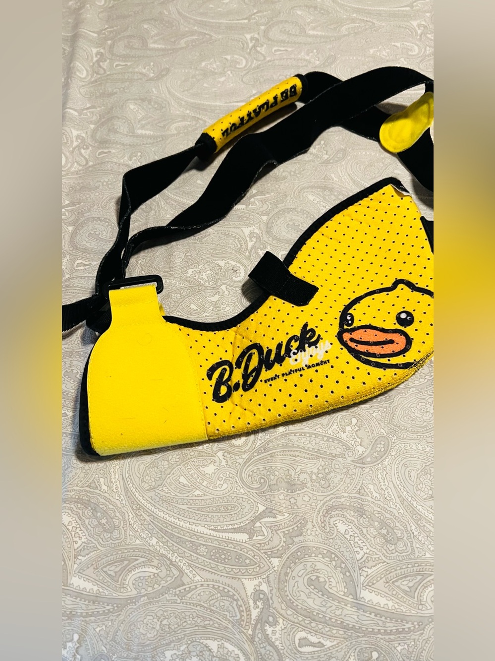 4 different  kidsarm slings 
B.Duck Yellow Duck Crossbody Strap shoulder support